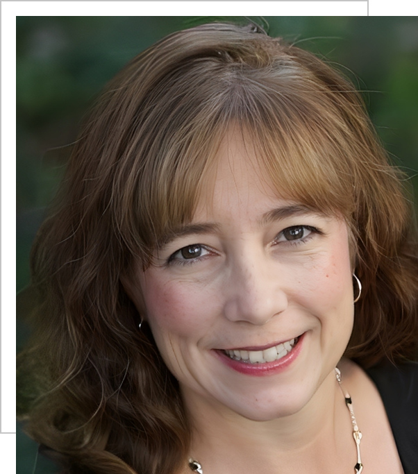 A woman with brown hair and green eyes.